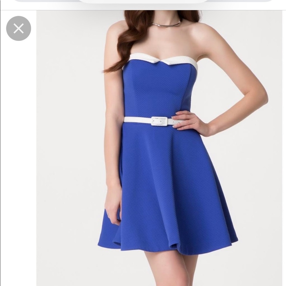 Bebe blue and white dress. Worn once. Excellent condition! Size 2-4